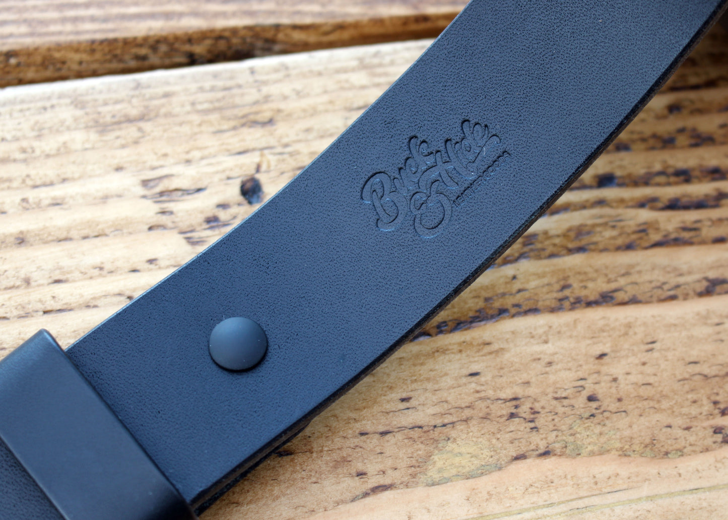 Blacked-out handmade veg-tan leather belt
