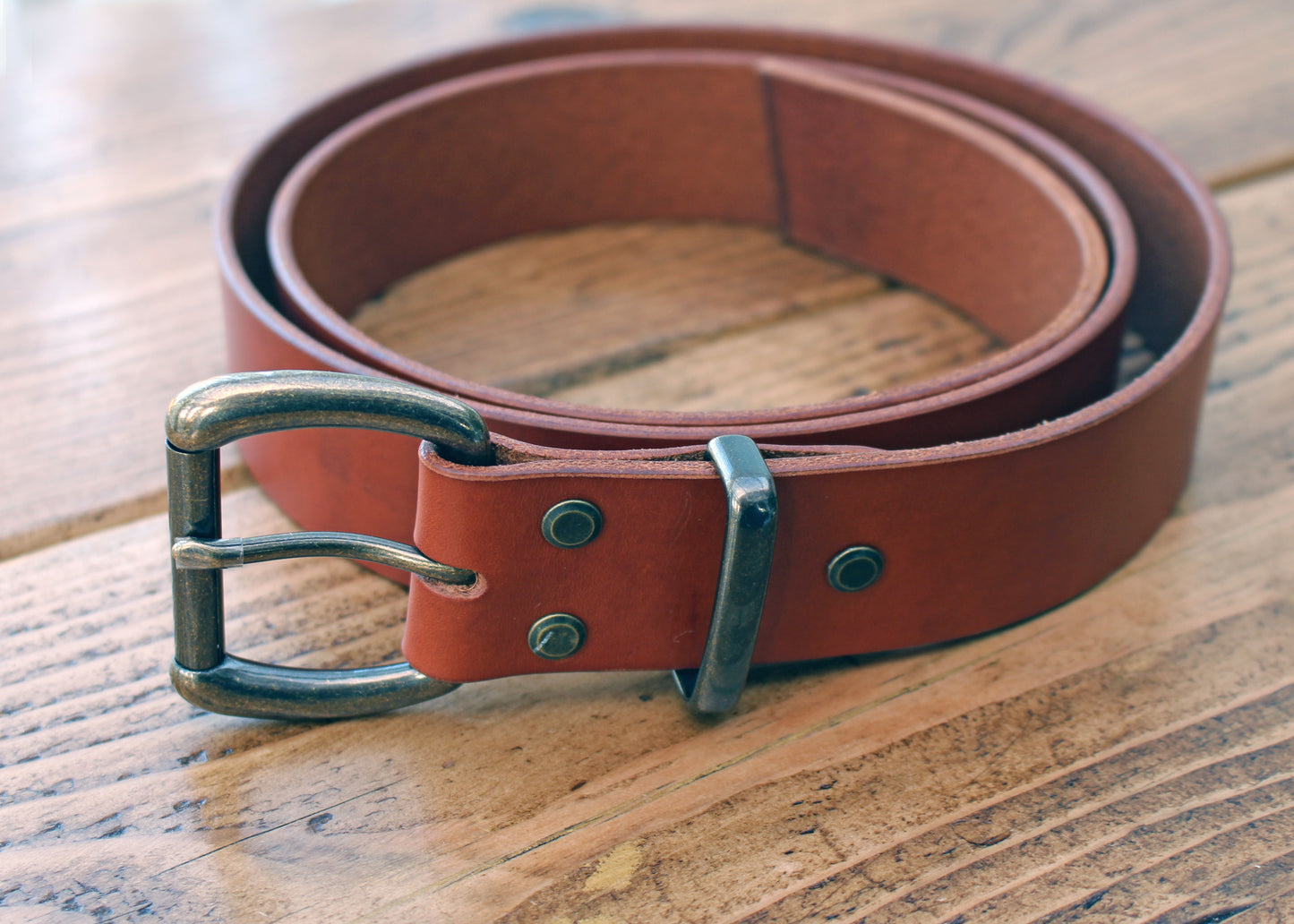 Handmade leather belt in saddle tan