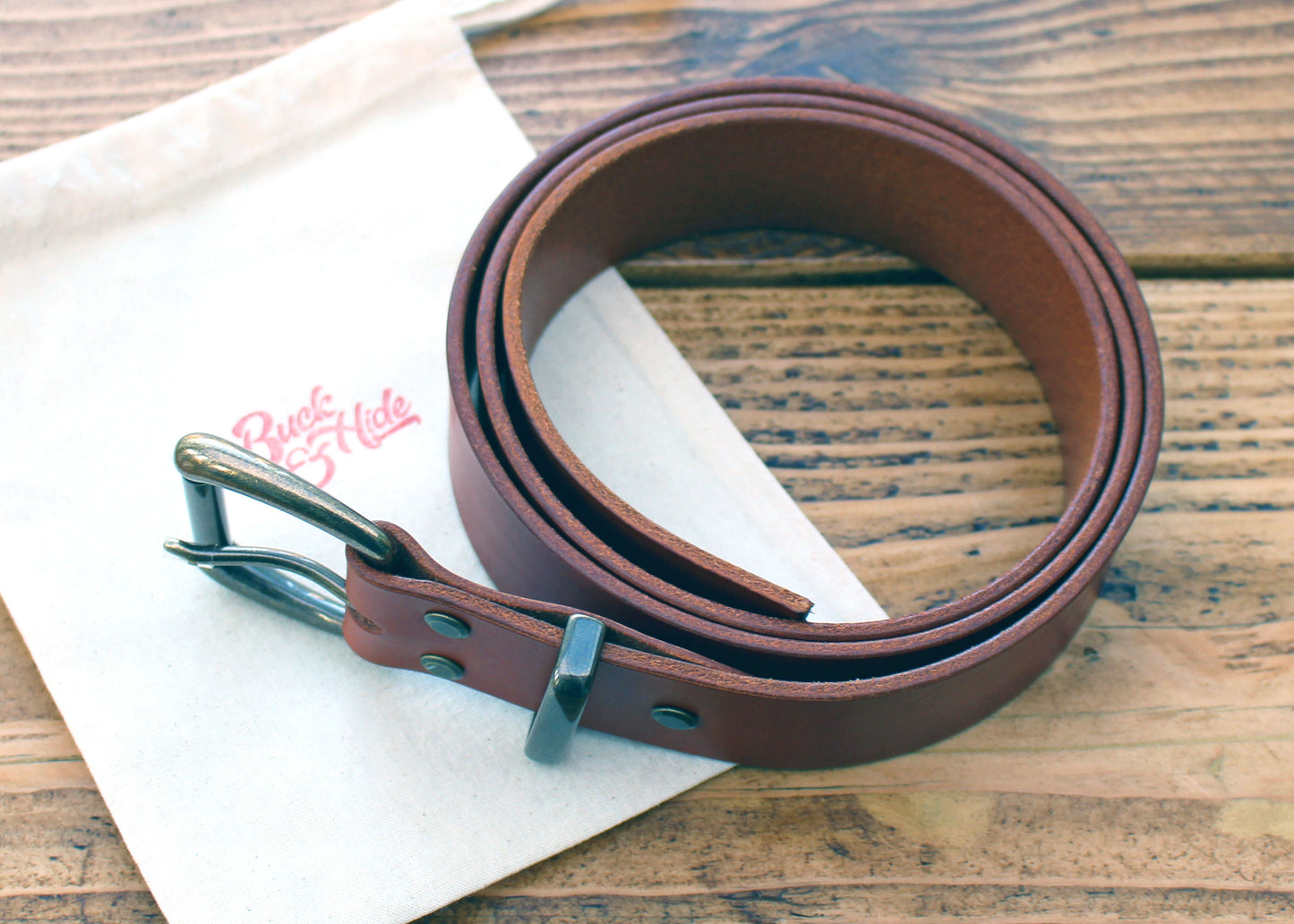 Handmade leather belt in saddle tan