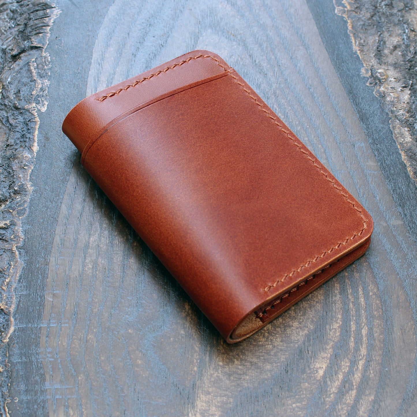 Card & cash bifold wallet, cognac Buttero leather.