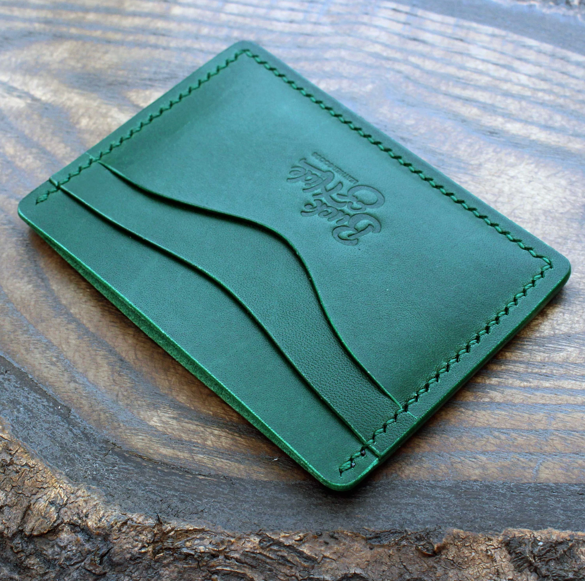 Custom order for Shane: short trucker wallet in green Buttero with nickel chain