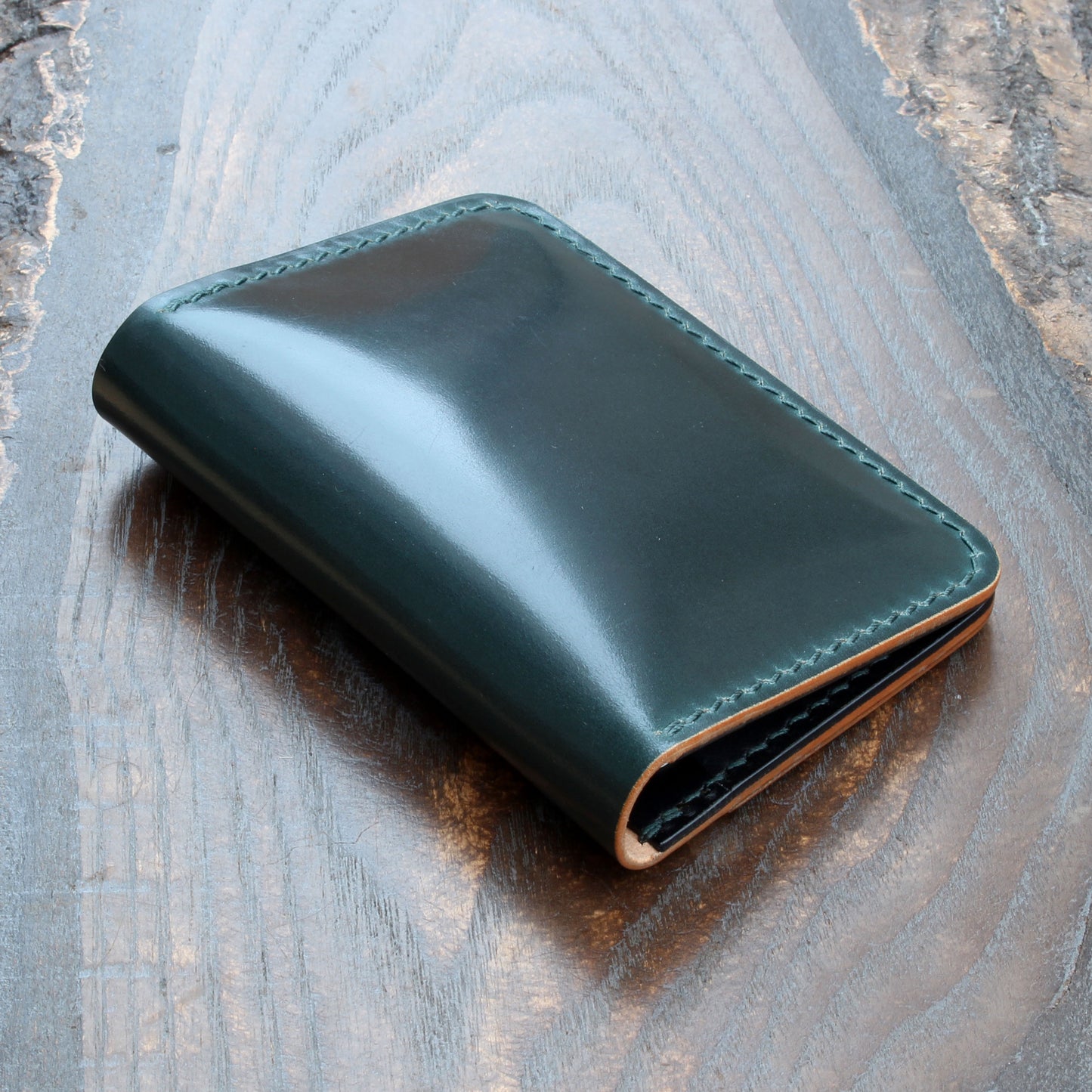 Green Shell Cordovan & black Buttero 5-slot card holder.