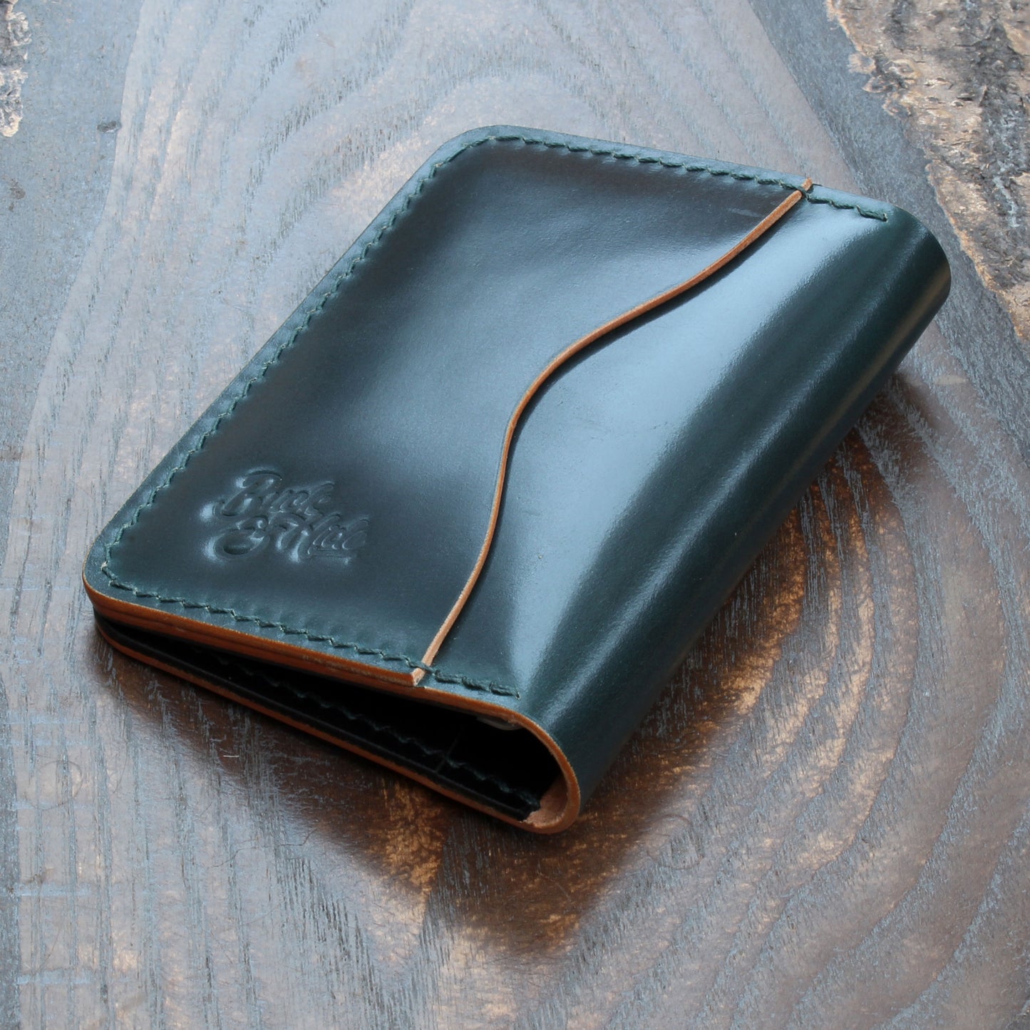 Green Shell Cordovan & black Buttero 5-slot card holder.