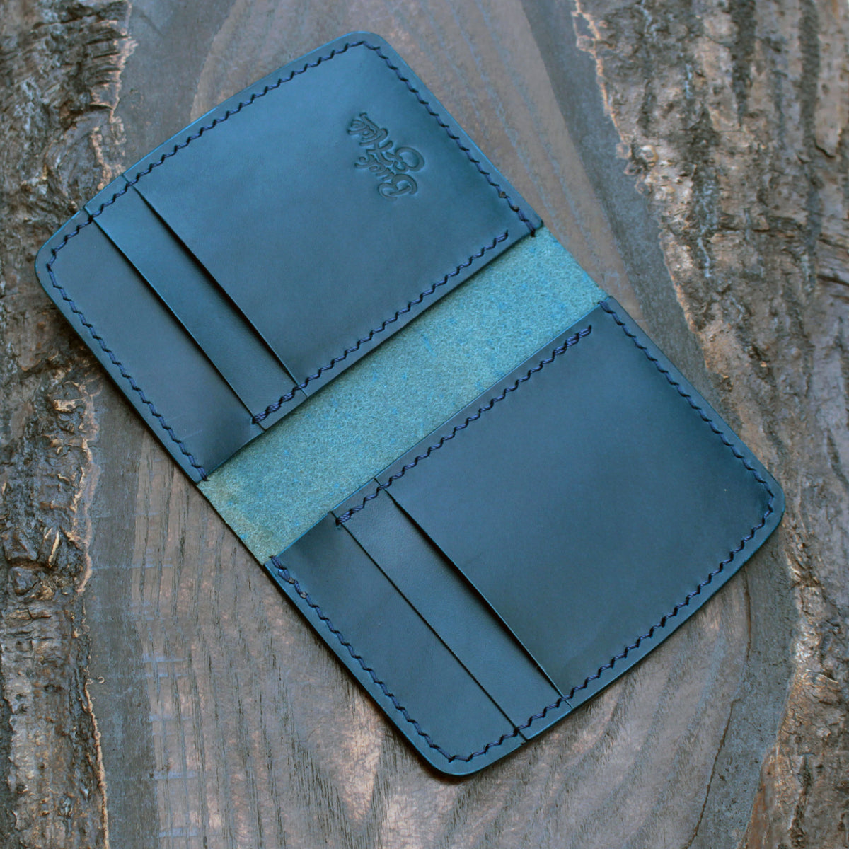 Six pocket leather wallet, hatched & smooth navy Buttero
