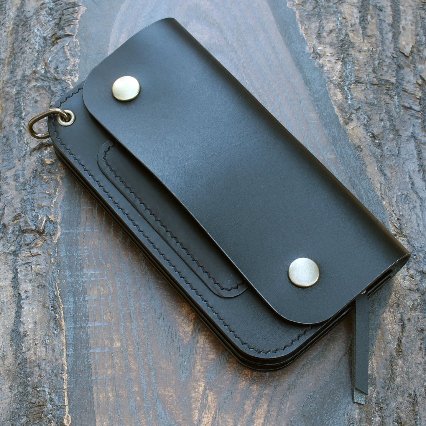 Long triple trucker wallet in black Buttero