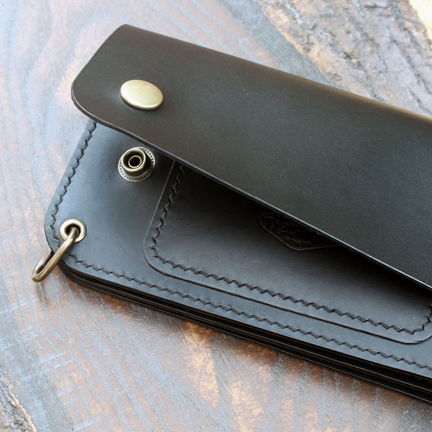 Long triple trucker wallet in black Buttero