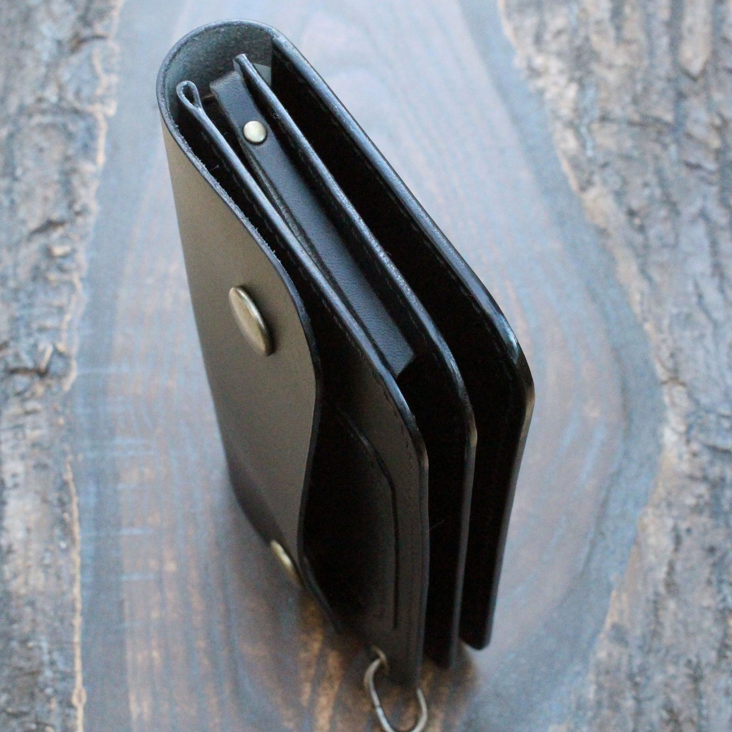 Long triple trucker wallet in black Buttero