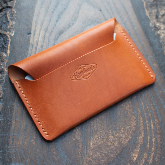Tan/orange leather tuck-in card holder.