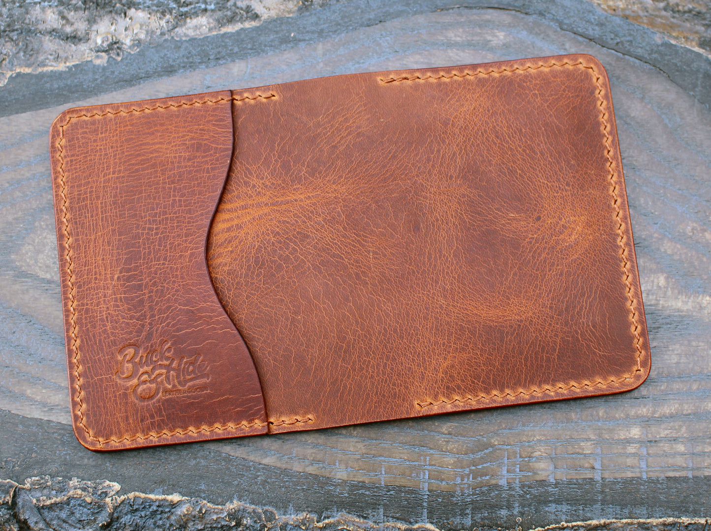 Five-slot bifold wallet, cognac Badalassi Wax leather.